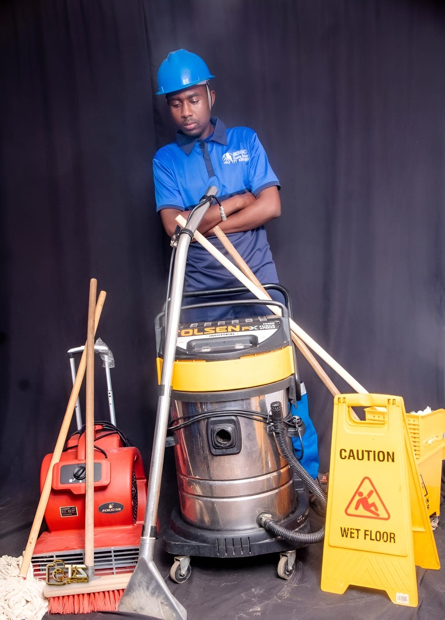 Brinancy cleaner alongside a professional wet and dry vacuum unit