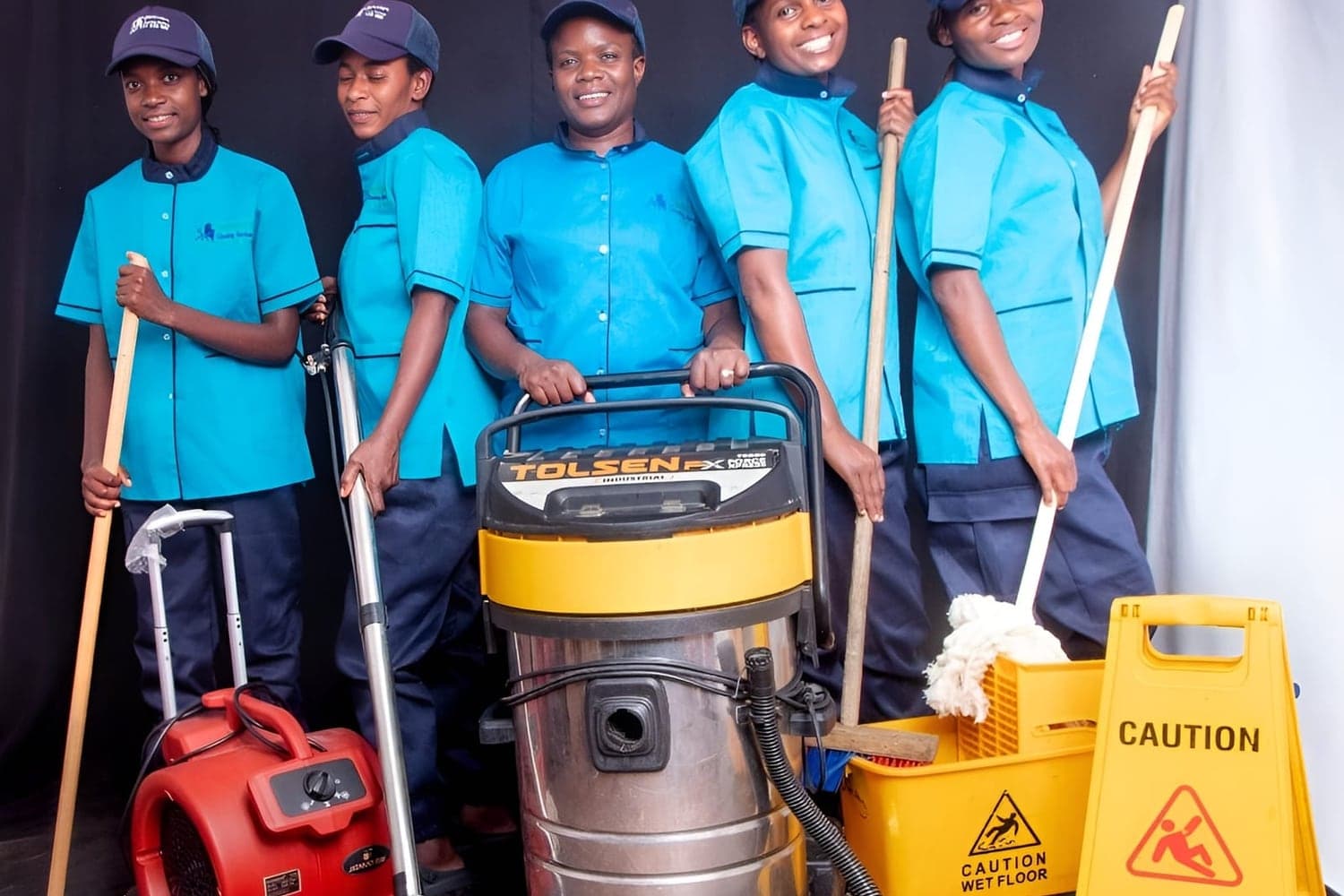 Brinancy crew with the industrial air mover and wet vacuum used to clear and dry a site before handover